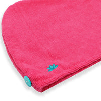 Close-up of the Cataleya turban hair towel fastening, fuchsia