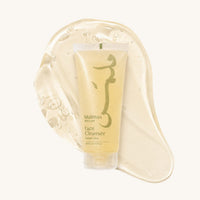Malmas Green Tea Face Cleanser tube on a swatch of the gel