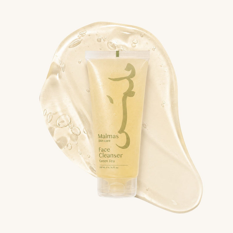 Malmas Green Tea Face Cleanser tube on a swatch of the gel
