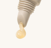 Close-up of Malmas Vanilla & Caramel Lip Balm SPF15 squeezed from the tube