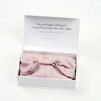 Esmé silk hair wrap in pink, folded in a gift box