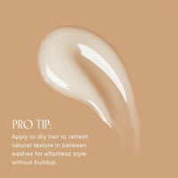 Close-up of Innersense Air Dry Styling Cream texture with a styling tip