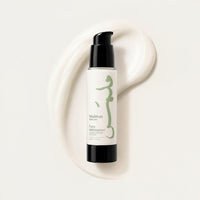 Malmas Daily Face Moisturizer pump bottle on a swatch of the cream