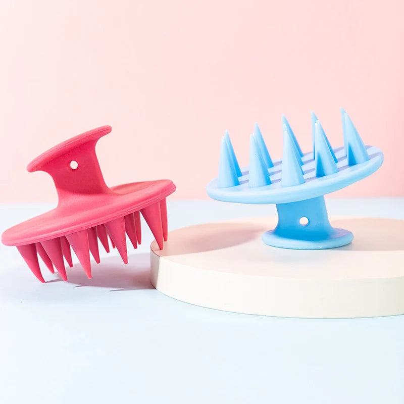 Shop Curls scalp massagers in pink and blue
