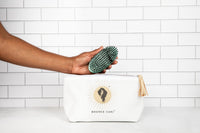 Bounce Curl Vegan Smoothing Brush with a Bounce Curl bag